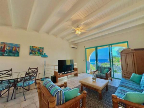 Pelican 2 bedr ocean view apt- shared pool